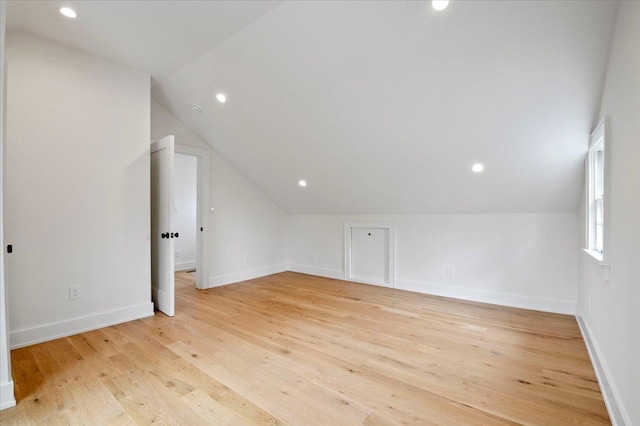 1000 Washington Dr, Centerport, NY 11721 - additional living space with lofted ceiling, light wood finished floors, and recessed lighting
