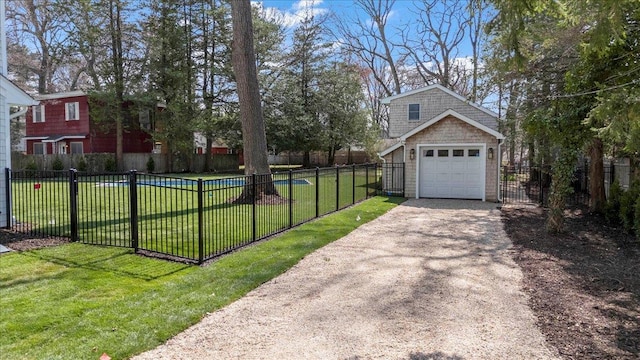 1000 Washington Dr, Centerport, NY 11721 - view of yard with driveway and a garage