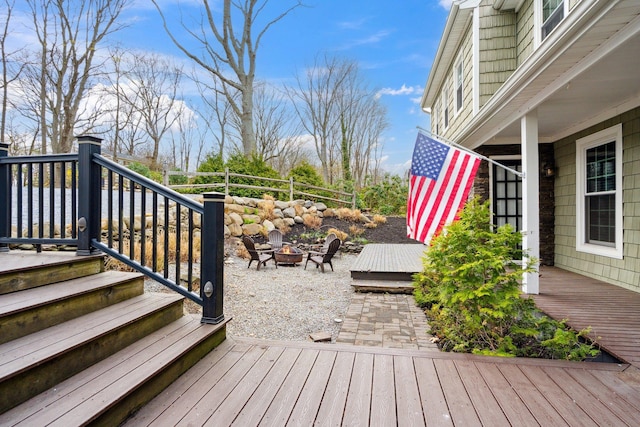 deck with a fire pit