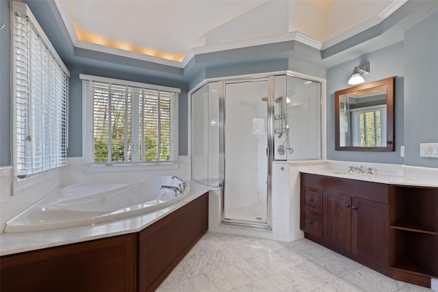 full bathroom with a garden tub, a stall shower, vanity, marble finish floor, and lofted ceiling