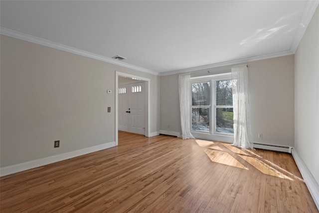 unfurnished living room featuring wood finished floors, visible vents, ornamental molding, baseboards, and a baseboard radiator