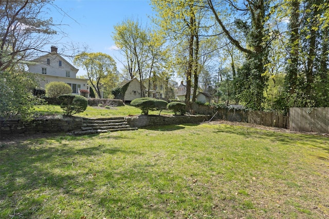 view of yard featuring fence