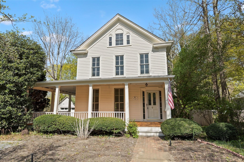 197 Christian Ave, Stony Brook, NY 11790 - view of front of property with fence and covered porch
