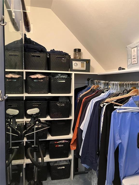 19 Tatterson St, Roslyn, NY 11576 - walk in closet with vaulted ceiling
