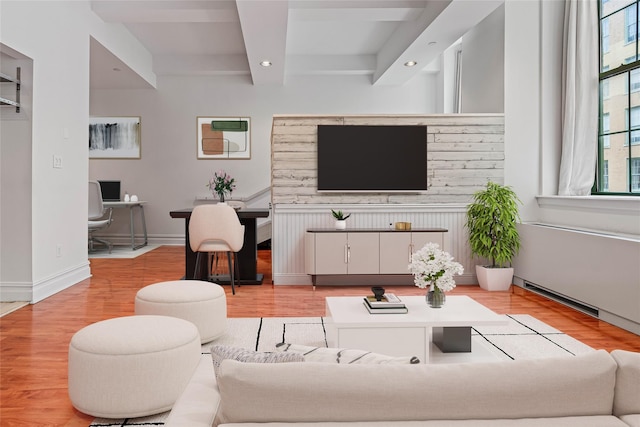 living room featuring recessed lighting, beam ceiling, light wood-style floors, a desk, and baseboards