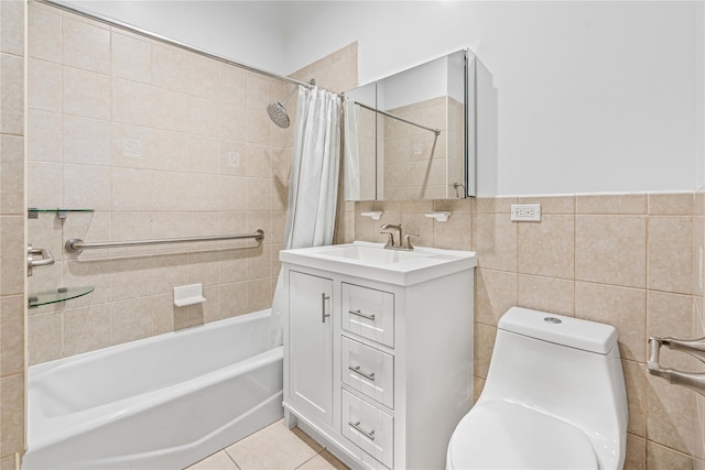 bathroom featuring toilet, tile walls, shower / bath combo, vanity, and tile patterned floors