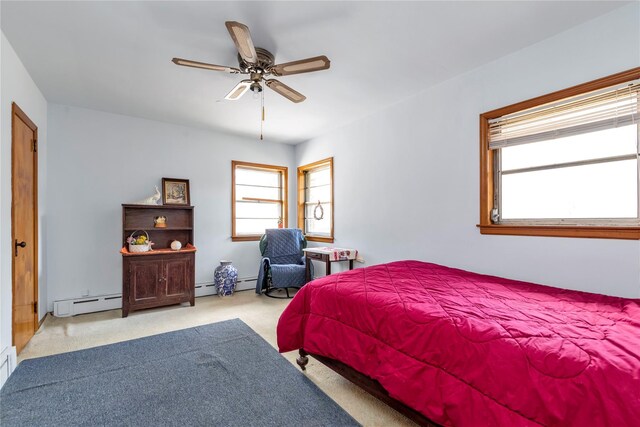 420 Old Country Rd, Melville, NY 11747 - carpeted bedroom with ceiling fan and a baseboard radiator