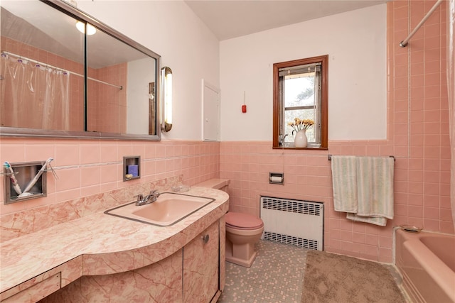 420 Old Country Rd, Melville, NY 11747 - bathroom with a tub to relax in, tile walls, a shower with curtain, radiator, and toilet
