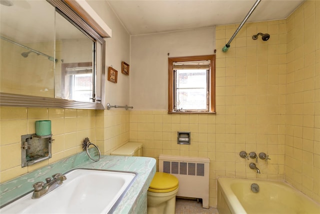 420 Old Country Rd, Melville, NY 11747 - full bathroom featuring a sink, tile walls, radiator, toilet, and tile patterned flooring