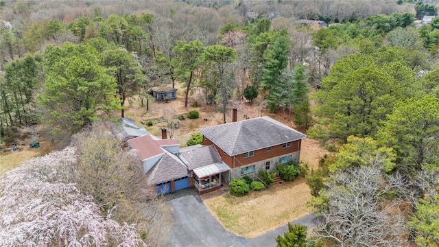 420 Old Country Rd, Melville, NY 11747 - birds eye view of property with a forest view
