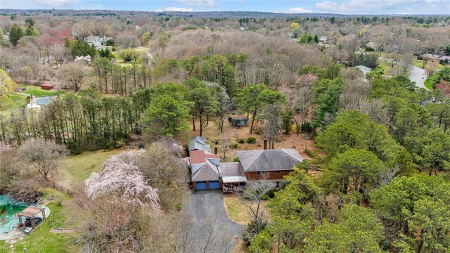 420 Old Country Rd, Melville, NY 11747 - aerial view with a forest view