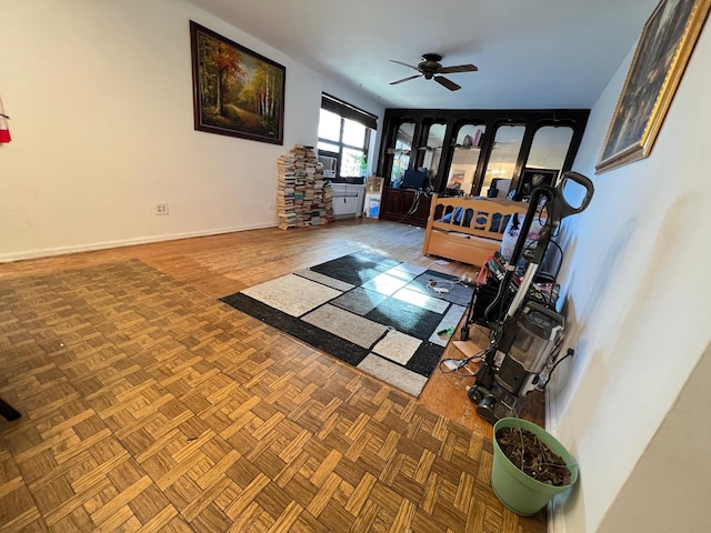 75-08 Bell Blvd Unit 2J, Bayside, NY 11364 - living room featuring baseboards and a ceiling fan