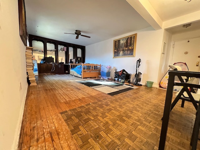 75-08 Bell Blvd Unit 2J, Bayside, NY 11364 - living area with wood finished floors, a ceiling fan, and baseboards