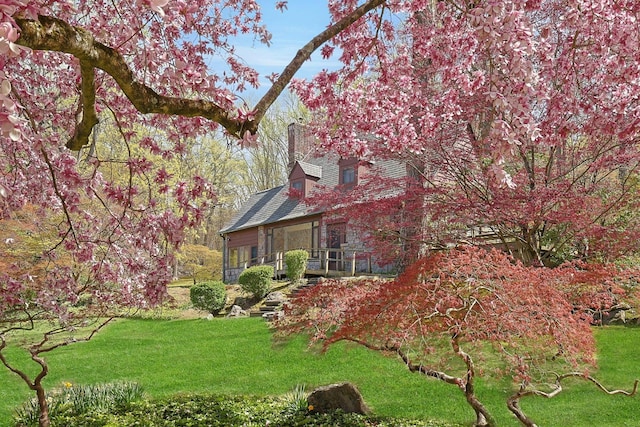 300 Sheldon Ave, Tarrytown, NY 10591 - view of side of home featuring a chimney and a lawn