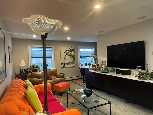living room with a baseboard radiator, light carpet, and recessed lighting