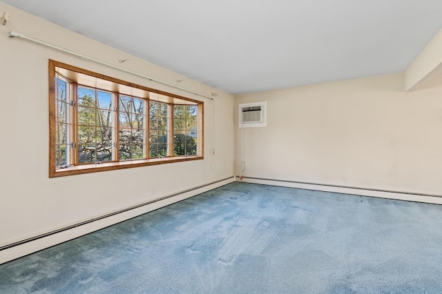 carpeted empty room featuring baseboard heating and a wall unit AC