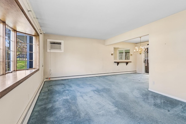 carpeted spare room featuring a baseboard heating unit, an AC wall unit, baseboards, and a notable chandelier