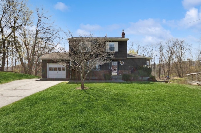 traditional-style house with concrete driveway, a garage, a chimney, and a front yard