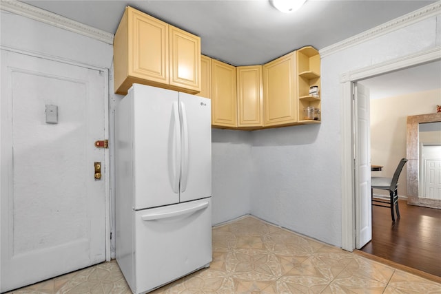 150-10 71st Ave Unit 5H, Kew Garden Hills, NY 11367 - kitchen with light brown cabinetry, open shelves, and freestanding refrigerator