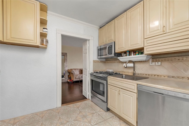150-10 71st Ave Unit 5H, Kew Garden Hills, NY 11367 - kitchen featuring appliances with stainless steel finishes and cream cabinetry