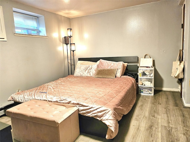 132-29 Brookville Blvd, Rosedale, NY 11422 - bedroom with wood finished floors and baseboards