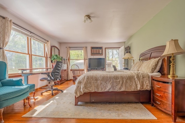 bedroom featuring wood finished floors