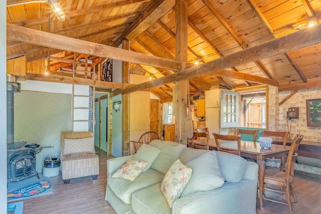 living room featuring wooden ceiling and wood finished floors