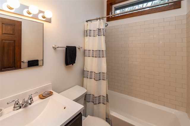 bathroom with toilet, vanity, and shower / bathtub combination with curtain