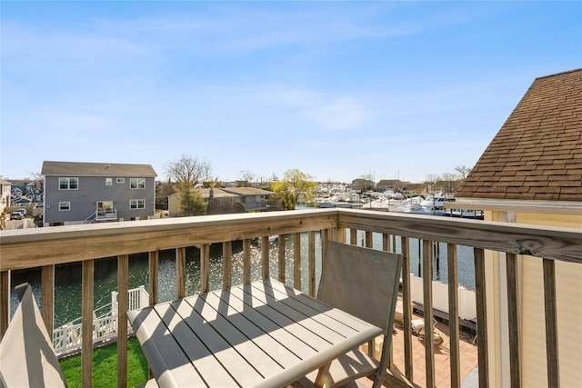 243 Sportsmans Ave, Freeport, NY 11520 - deck with outdoor dining area and a water view