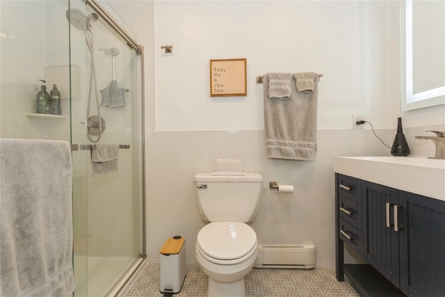 243 Sportsmans Ave, Freeport, NY 11520 - full bathroom with a baseboard heating unit, toilet, vanity, and a stall shower