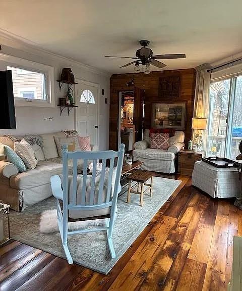 70 Mill Road Ext, Hyde Park, NY 12538 - living room with ceiling fan, dark wood-style flooring, and ornamental molding