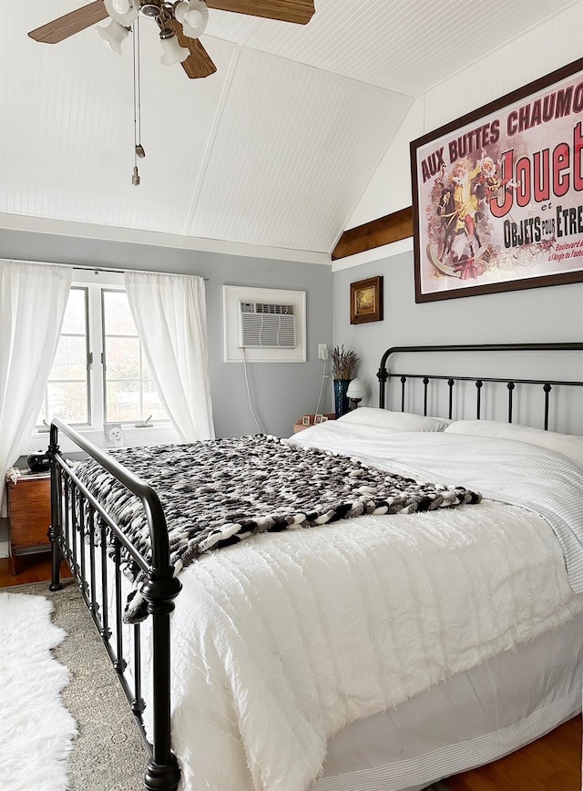 70 Mill Road Ext, Hyde Park, NY 12538 - bedroom with a wall unit AC, wood finished floors, vaulted ceiling, and a ceiling fan