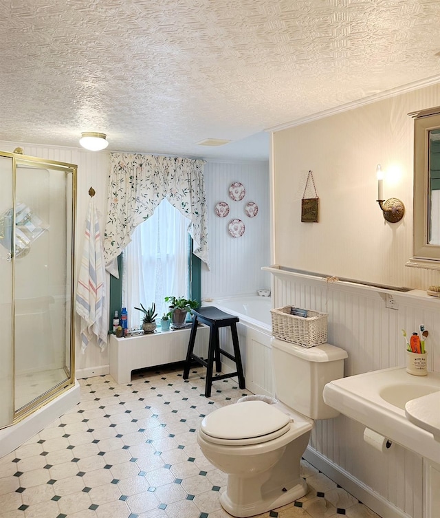 70 Mill Road Ext, Hyde Park, NY 12538 - bathroom featuring a stall shower, toilet, a garden tub, and tile patterned floors