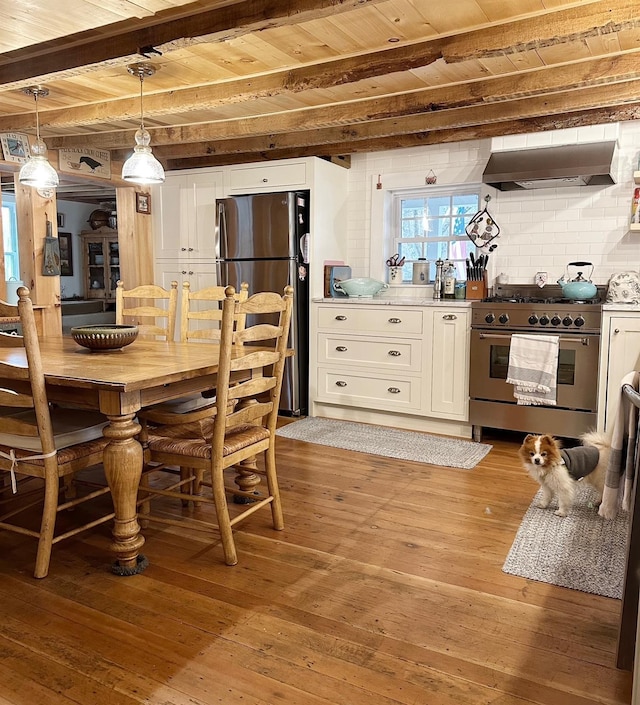 70 Mill Road Ext, Hyde Park, NY 12538 - dining space featuring light wood-style floors and wood ceiling with exposed beams
