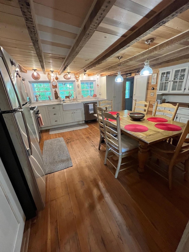 70 Mill Road Ext, Hyde Park, NY 12538 - dining area featuring light wood finished floors and wood ceiling with exposed beams