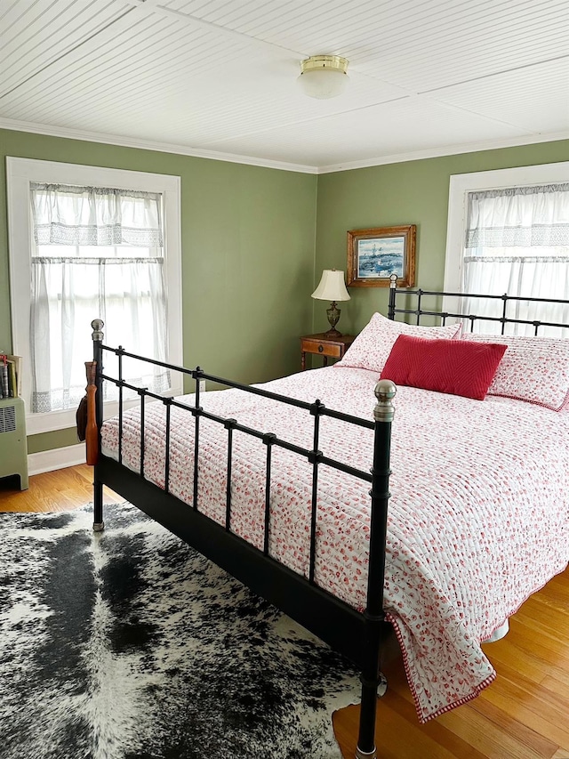 70 Mill Road Ext, Hyde Park, NY 12538 - bedroom with multiple windows, crown molding, and wood finished floors