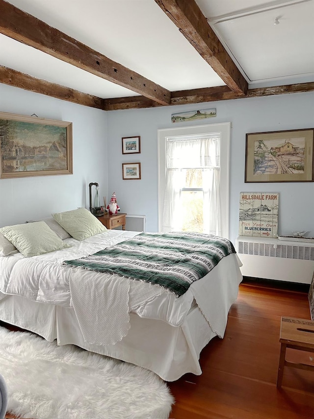 70 Mill Road Ext, Hyde Park, NY 12538 - bedroom featuring radiator, beam ceiling, and wood finished floors
