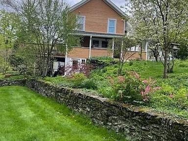 70 Mill Road Ext, Hyde Park, NY 12538 - back of house with a lawn