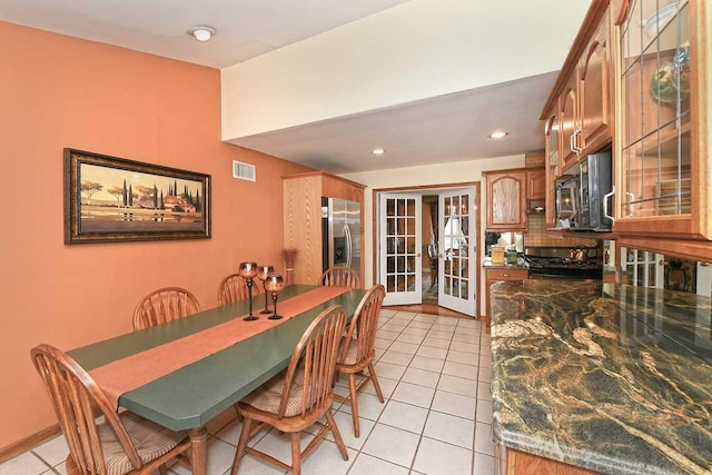 dining room featuring french doors, visible vents, recessed lighting, and light tile patterned floors