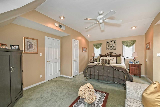 bedroom featuring vaulted ceiling, baseboards, visible vents, carpet, and a ceiling fan