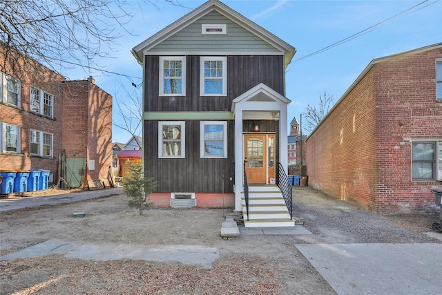 view of front of home featuring board and batten siding and entry steps