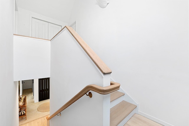 211 Red Dirt Rd, East Hampton, NY 11937 - stairs featuring baseboards and wood finished floors