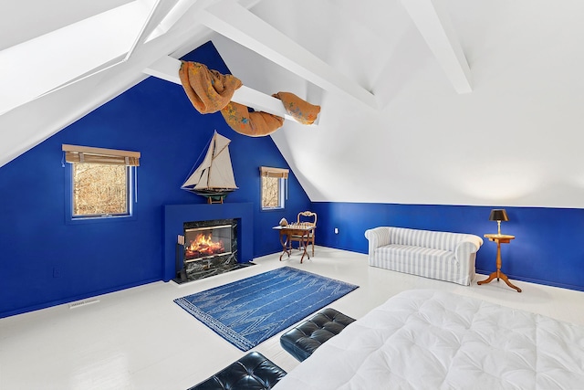 211 Red Dirt Rd, East Hampton, NY 11937 - bedroom with a fireplace with flush hearth, visible vents, and lofted ceiling with beams
