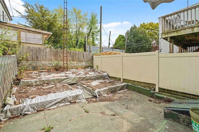 view of yard with a fenced backyard and a patio area