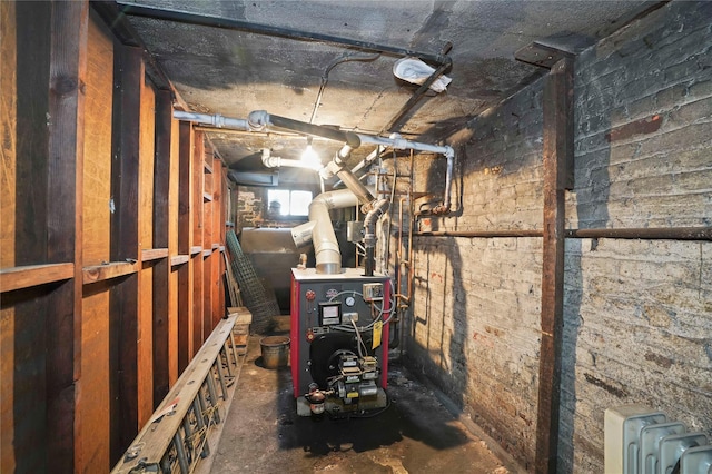 utility room featuring a heating unit
