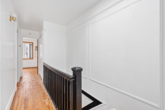 69-06 79th St, Middle Village, NY 11379 - hallway featuring light wood-style flooring and baseboards