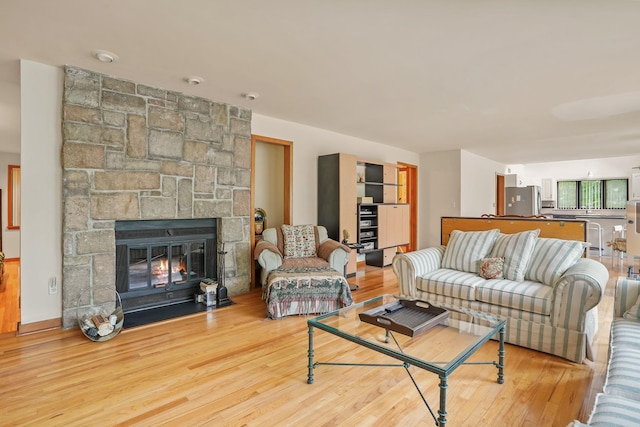 48 Sabbath Day Hill Rd, South Salem, NY 10590 - living room with wood finished floors and a stone fireplace