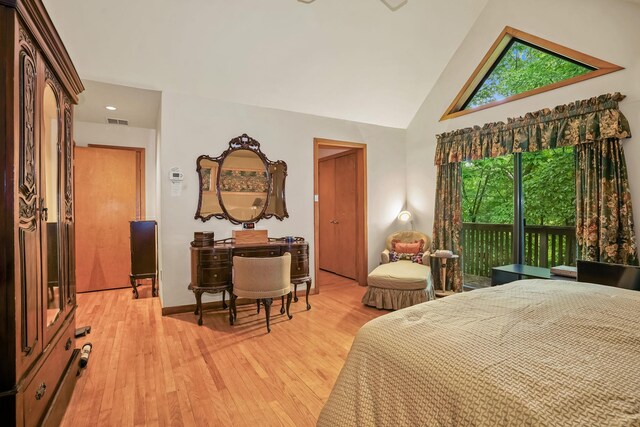 48 Sabbath Day Hill Rd, South Salem, NY 10590 - bedroom with light wood-type flooring and vaulted ceiling