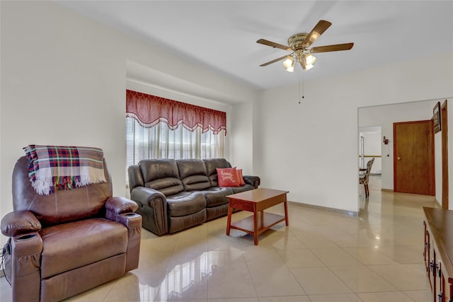 13042 NW 59th Ave, Flushing, NY 11355 - living room featuring baseboards, ceiling fan, and light tile patterned floors