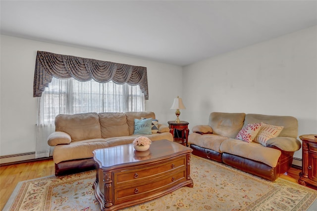 13042 NW 59th Ave, Flushing, NY 11355 - living room with a baseboard radiator and light wood finished floors